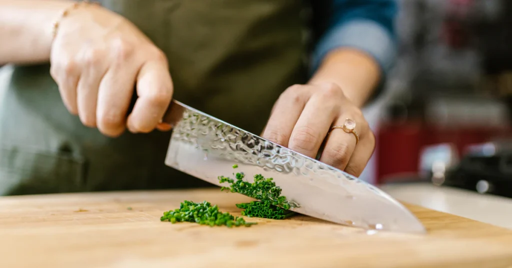 8 inch chef knife blade on cutting board