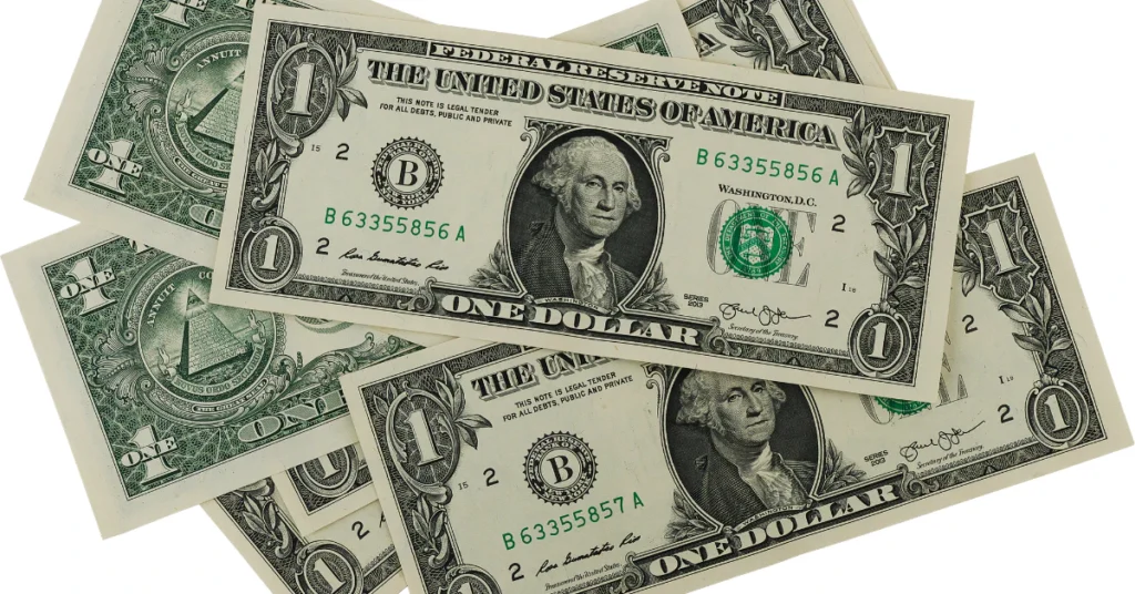 Water bottle and dollar bill used to estimate 8 inches