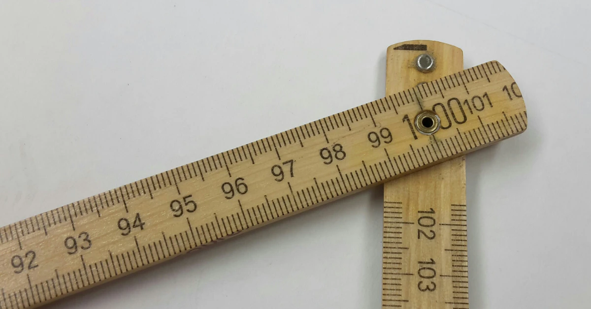 Wooden folding ruler with centimeter and inch markings
