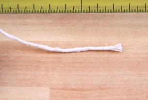 How long is 4 inches, string stretched along a ruler