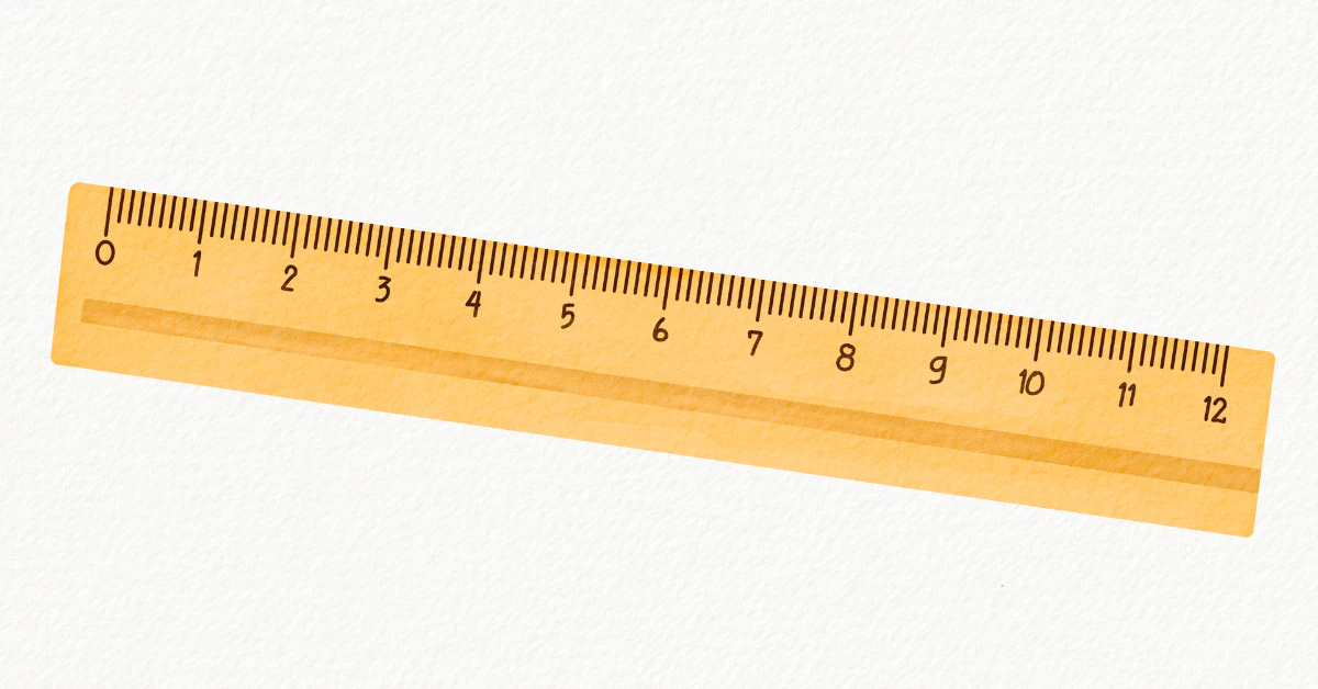 Wooden ruler lying flat, used to measure how long 9 inches is